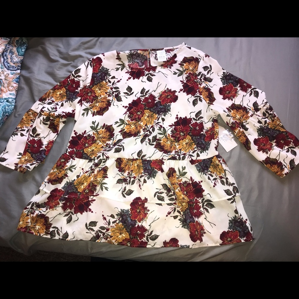 Beautiful floral peplum top!